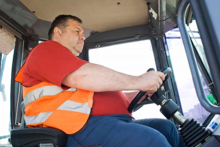 Man driving tractor